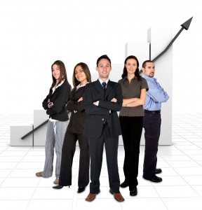bigstockphoto_Business_Team_In_Front_Of_A_Gr_905709